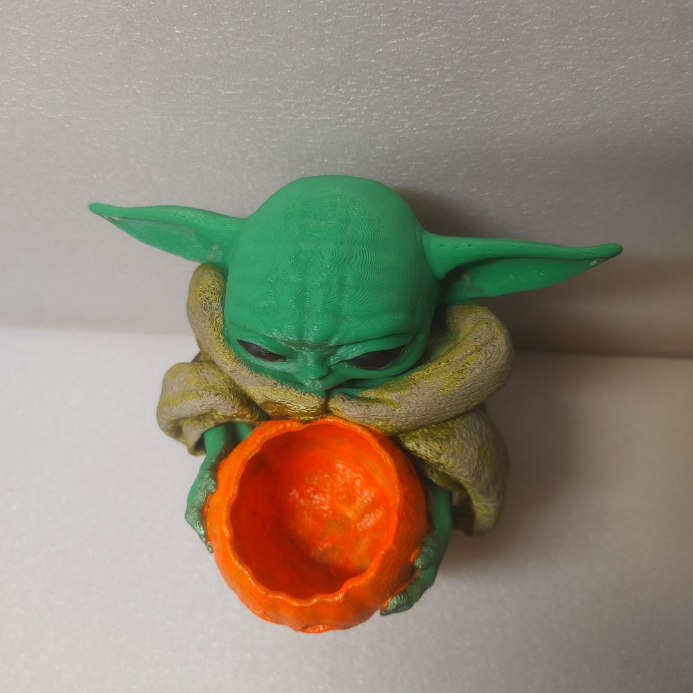 Green Baby Yoda Figurine Holding Orange Pumpkin - Picture 5 of 9